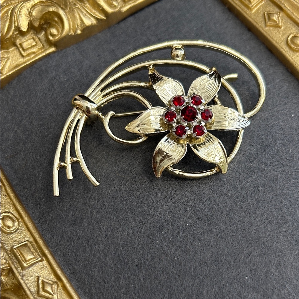 Gold-Tone Floral Brooch with Red Crystal Accents